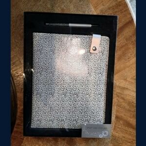 Elegant Silver Notebook with Pen